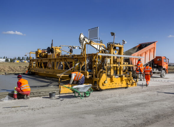 Workers,Were,Pouring,Concrete,On,Road